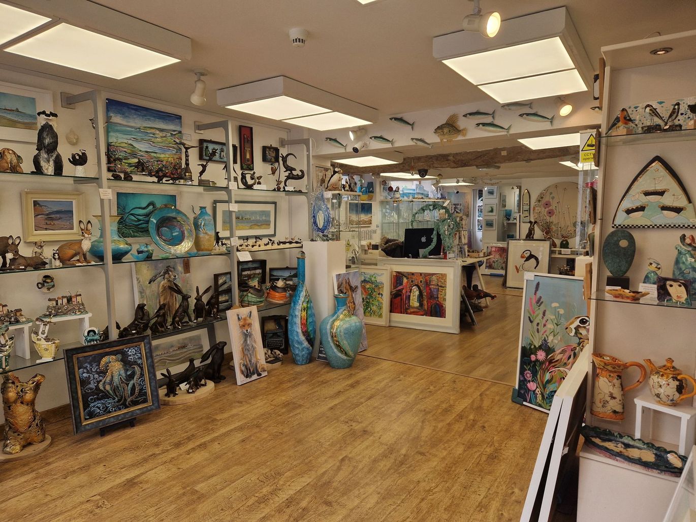 Sculpture plinth and paintings, Azure Gallery interior